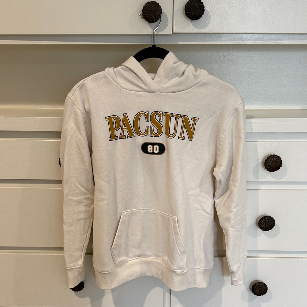 PacSun Cream Hoodie with Gold and Black Accents